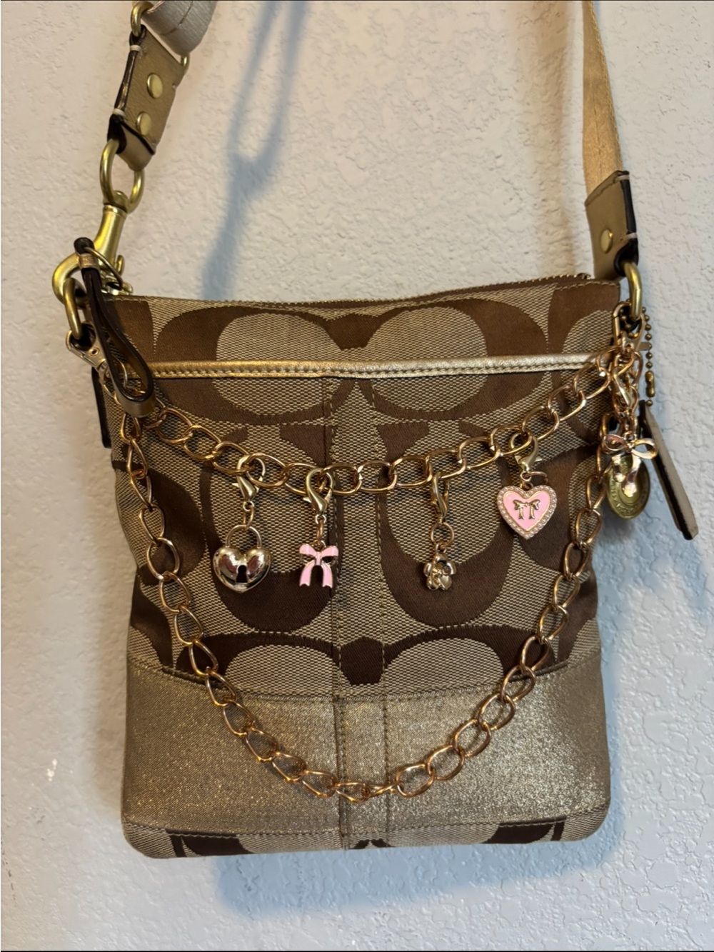 Coach Brown Signature Canvas Crossbody with Gold Chain and Pink Charm